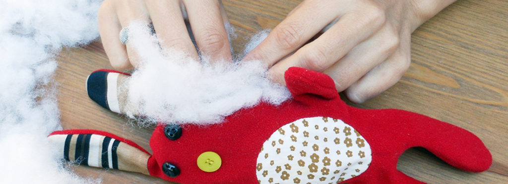 Wilma creates a personalized plush toy from a child’s drawing in her workshop in Montpellier.